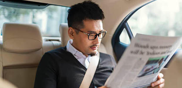 A passenger in an Uber vehicle.