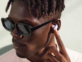 Man wearing Beats Fit Pro earbuds