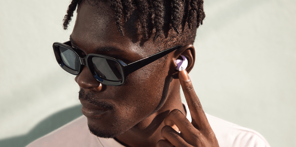 Man wearing Beats Fit Pro earbuds