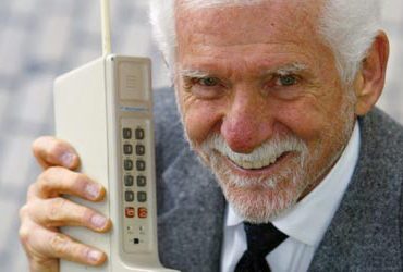 Dr. Martin Cooper holding cell phone