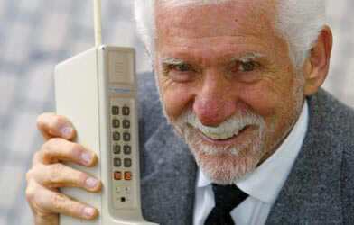 Dr. Martin Cooper holding cell phone