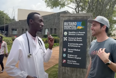 Mark Rober talks to a man in Rwanda about high-tech delivery drones.