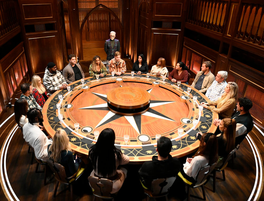 The players sitting around the roundtable on The Traitors