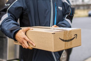 Man holding Amazon package