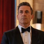 Jon Hamm fixing his tux in Your Friends and Neighbors