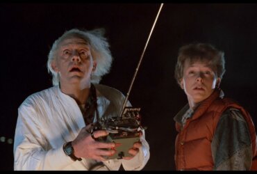 Doc and Marty looking up to the sky in the dark in Back to the Future.