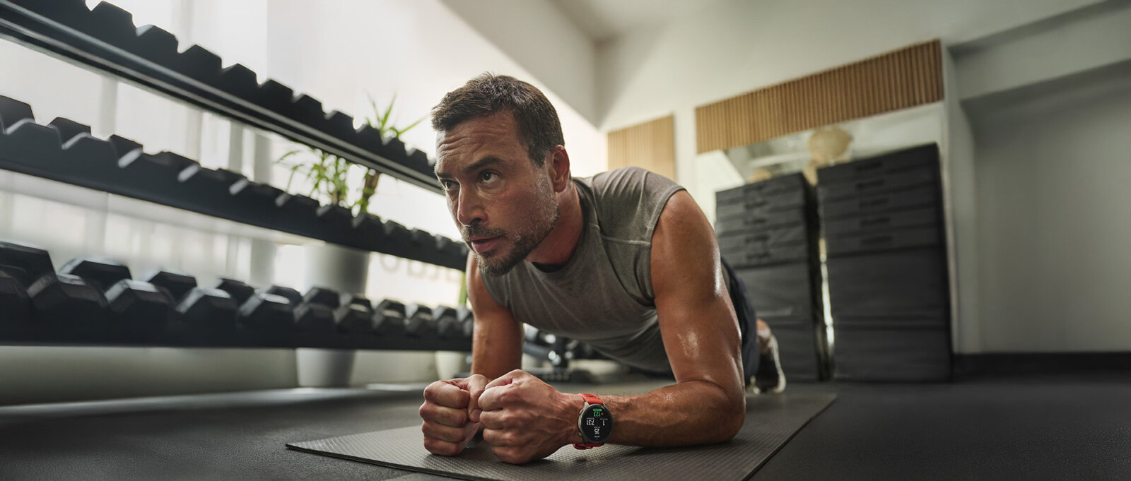 Amazfit Balance 2 on man in gym