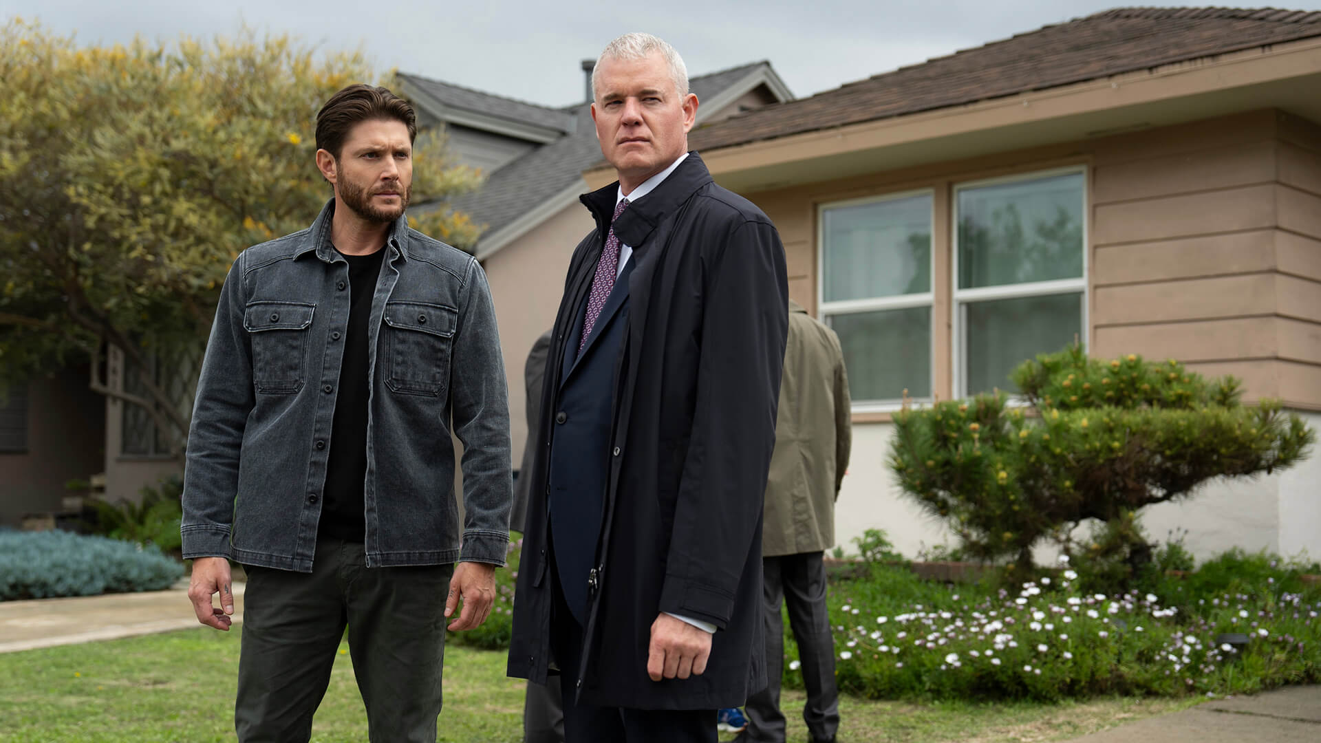 Mark and Nathan standing together in front of a house in Countdown