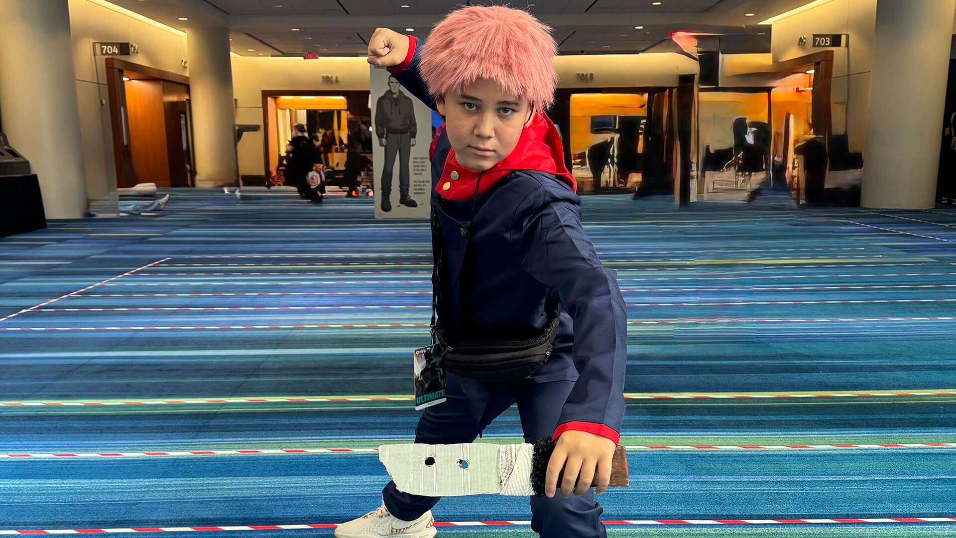 A young boy dressed in an anime outfit at Fan Expo Canada.