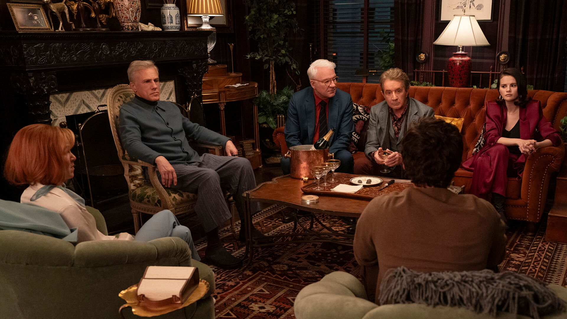 A group sitting together in Only Murders in the Building.