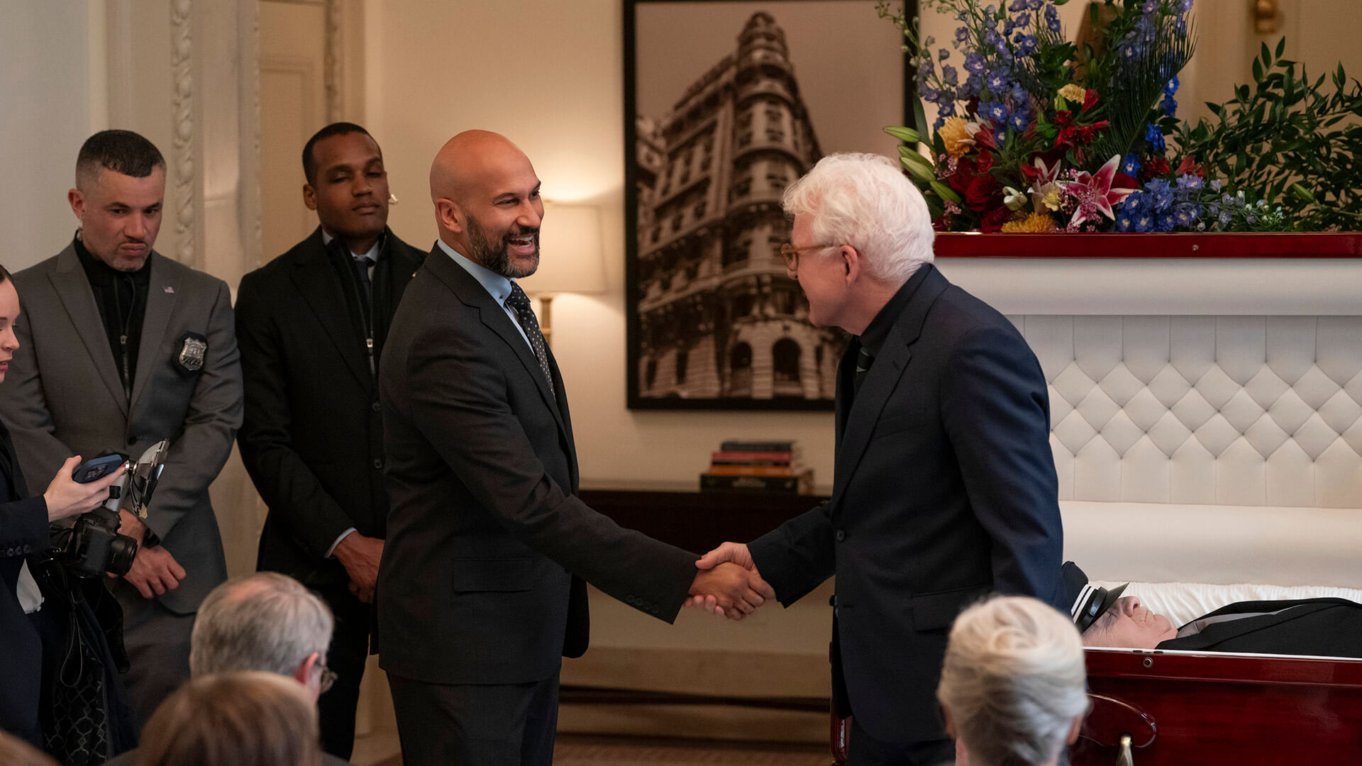Keegan-Michael Key shaking Charlies' hand in Only Murders in the Building.