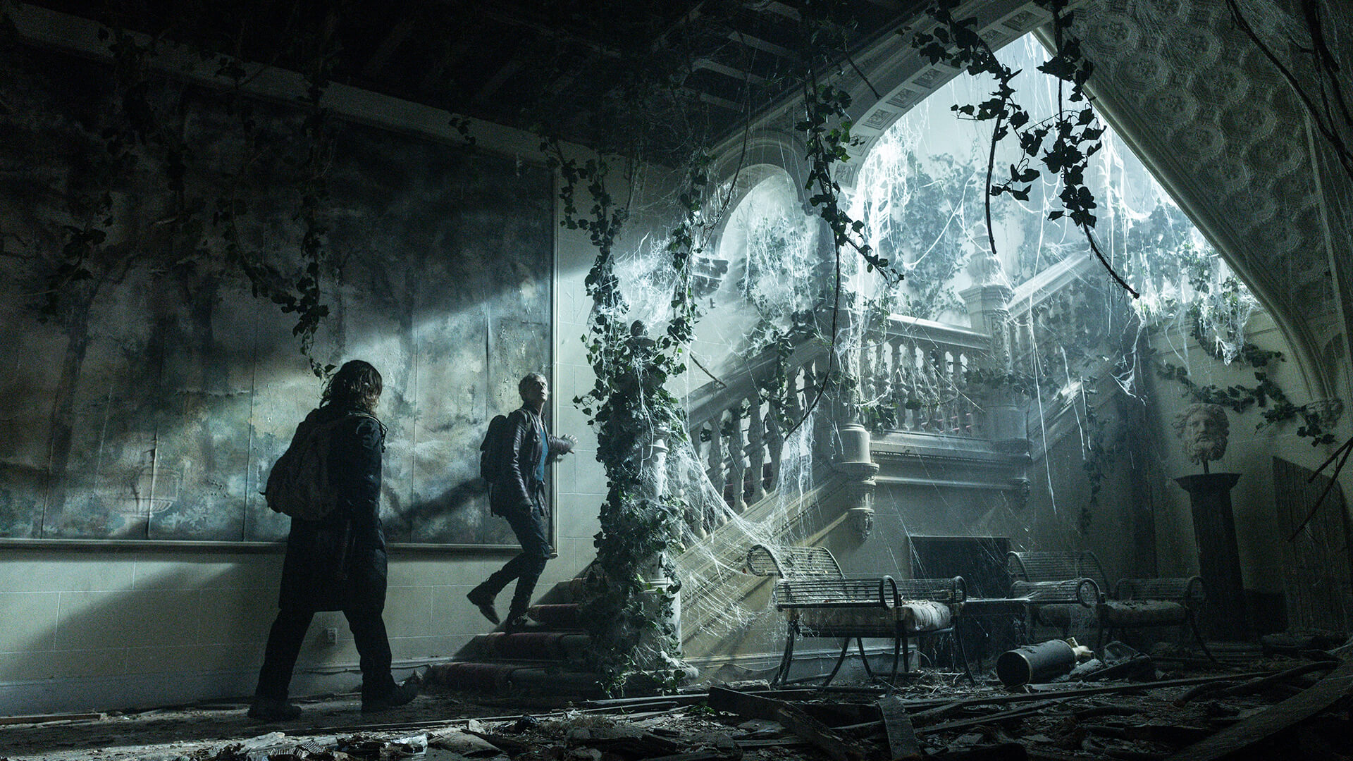 Daryl and Carol walk into an abandoned building in The Walking Dead: Daryl Dixon.