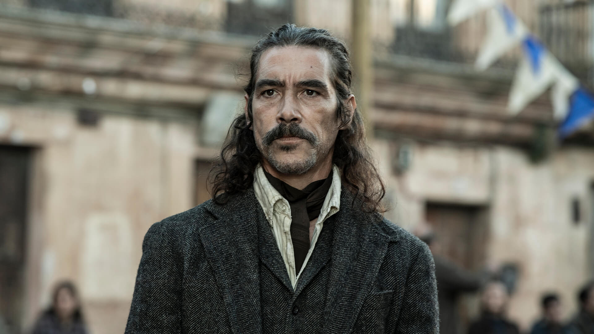 A man with long hair looking in The Walking Dead: Daryl Dixon.