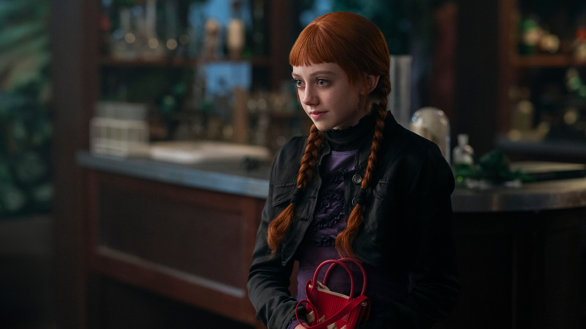 Agnes smiling in Wednesday.