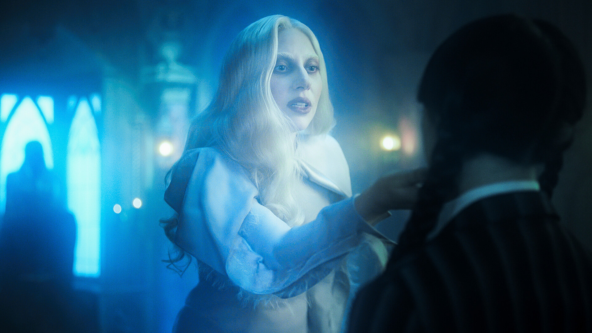 Lady Gaga as an apparition talking to Wednesday.