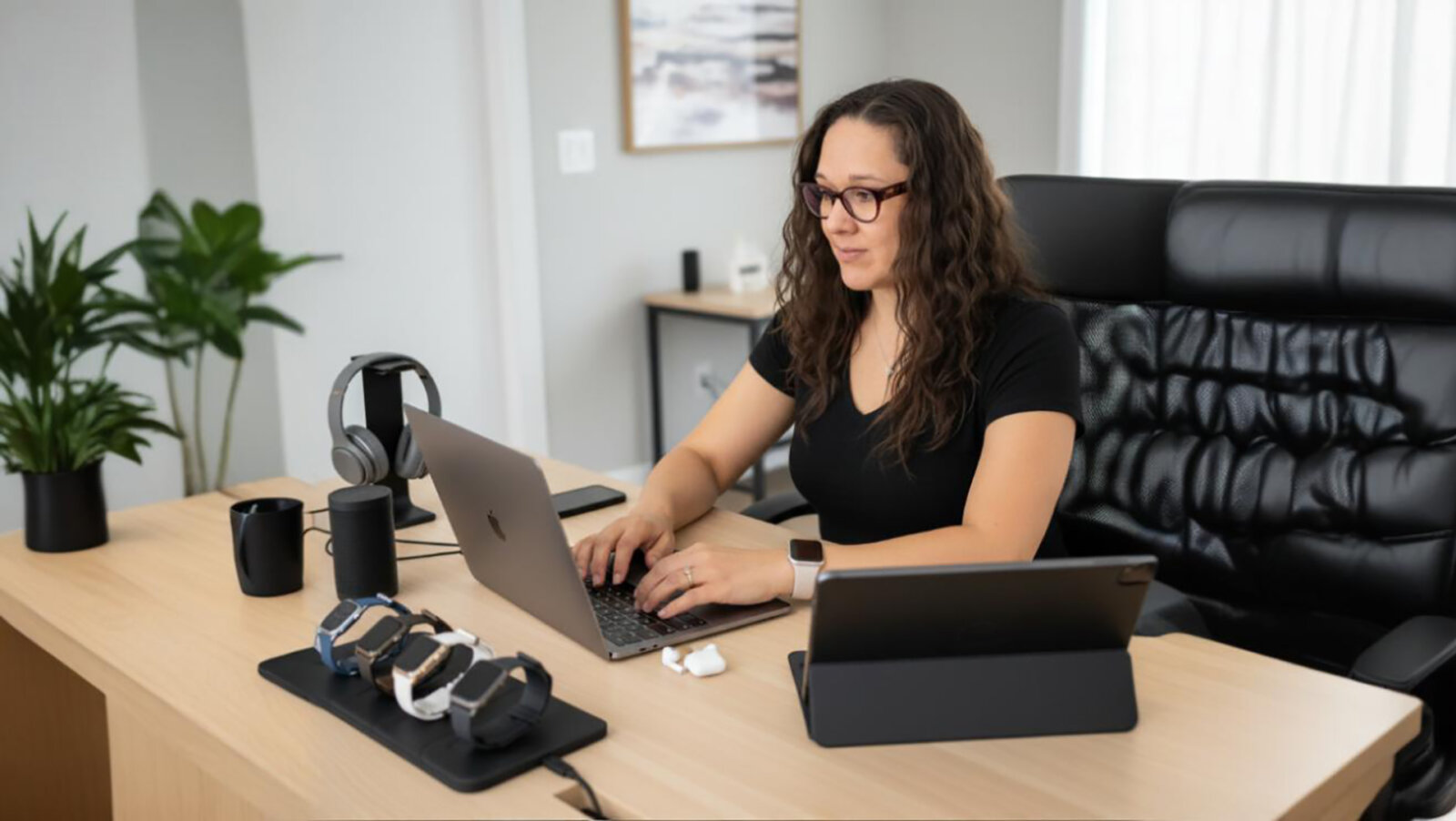 Woman sitting at a desk behind a computer