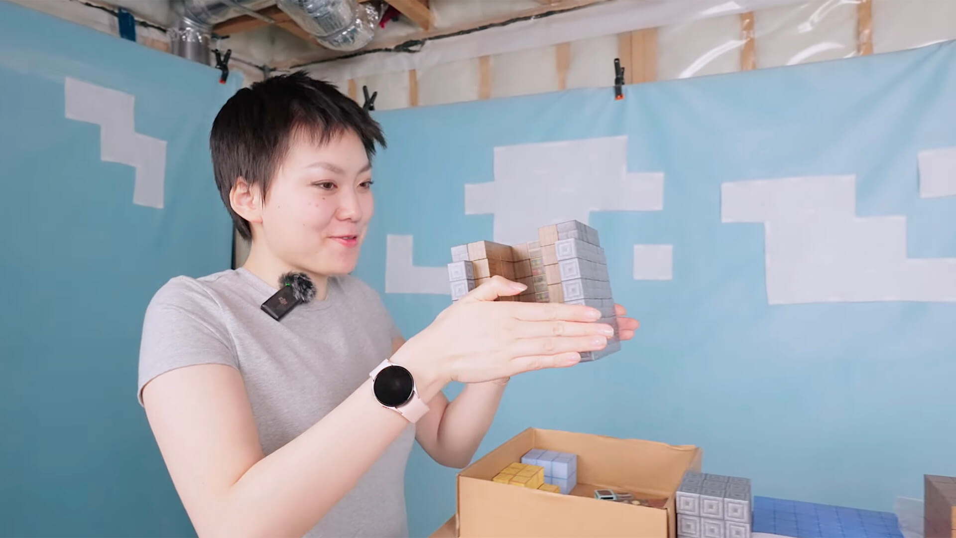 SleepyCrafter holding Minecraft bricks on YouTube