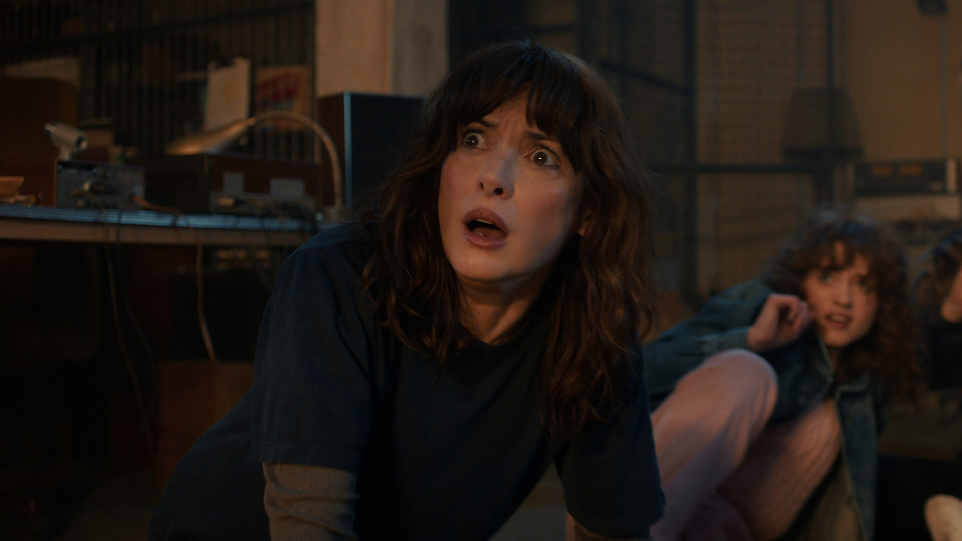 Joyce looking terrified in Stranger Things.