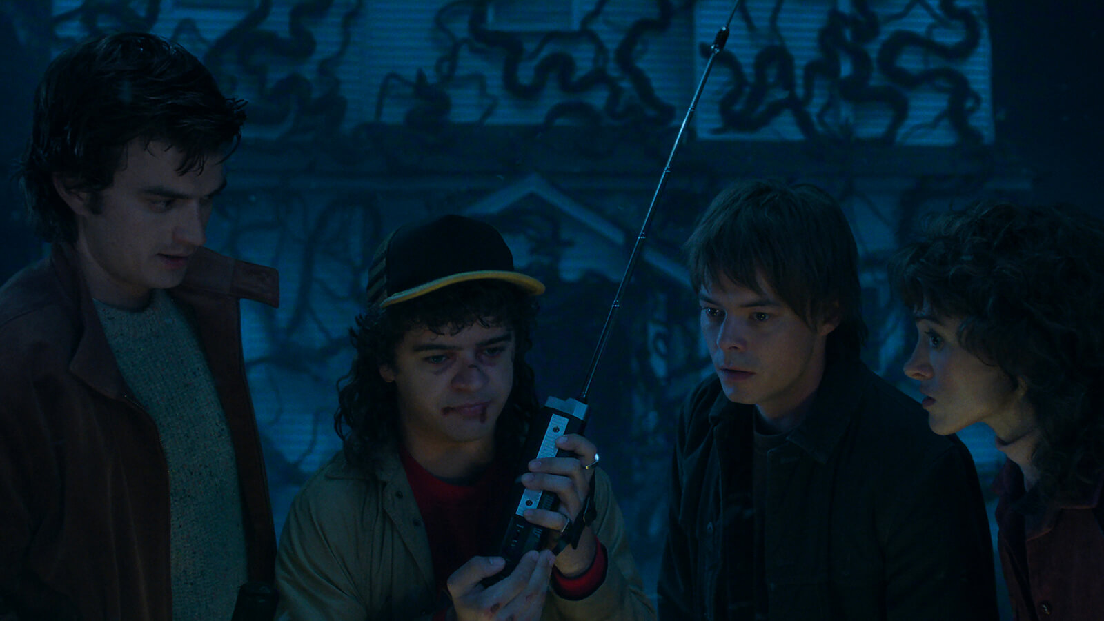 Steve, Dustin, Jonathan, and Nancy in the Upside Down in Stranger Things.
