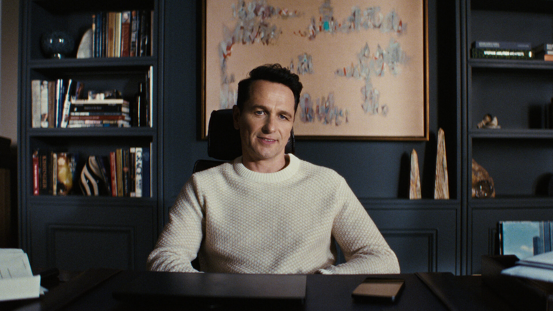 Nile sitting in his home office in The Beast in Me