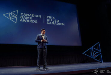 Carl-Edwin Michel, Creator and Executive Producer of the Canadian Game Awards, addresses the crowd at a previous event
