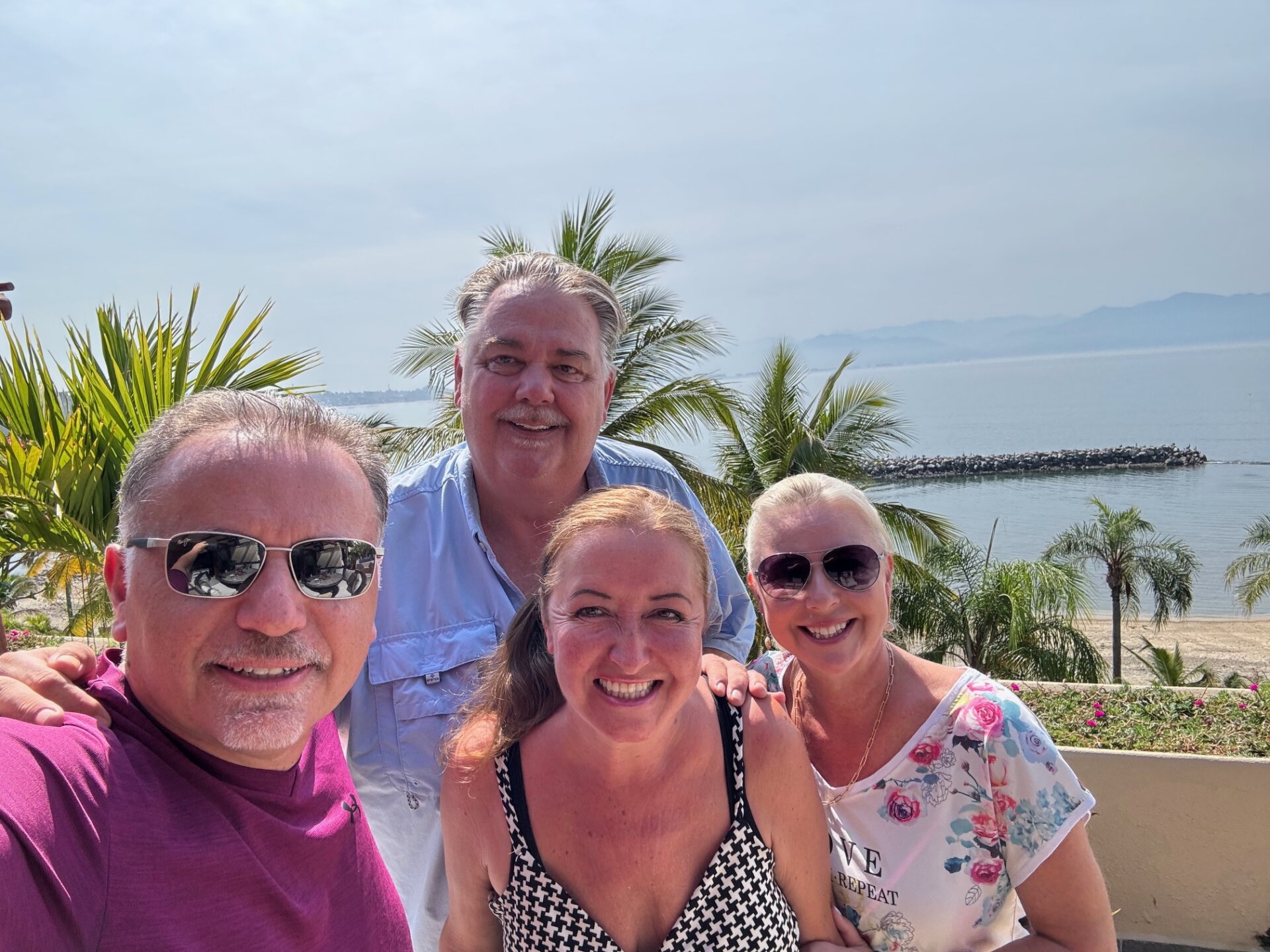 Eddie Bozo, Gemsen and his wife Kari pose with George and Rebecca in Mexico.