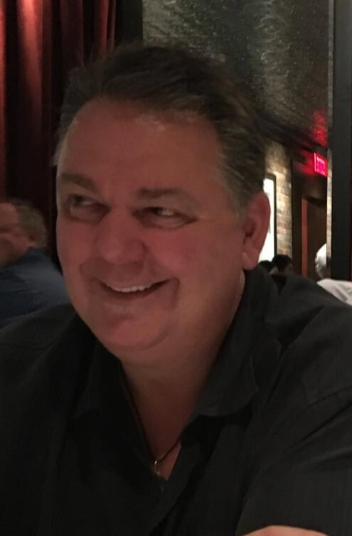 A close-up of George Finlayson smiling