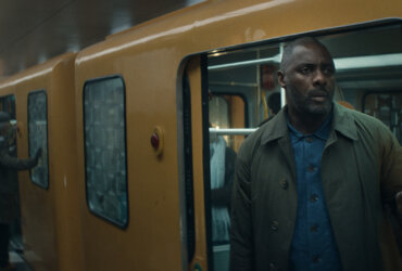 Sam outside of a train car in Hijack.