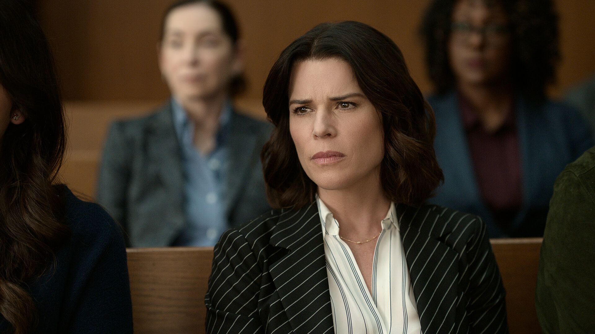 Maggie in court looking angry in The Lincoln Lawyer.