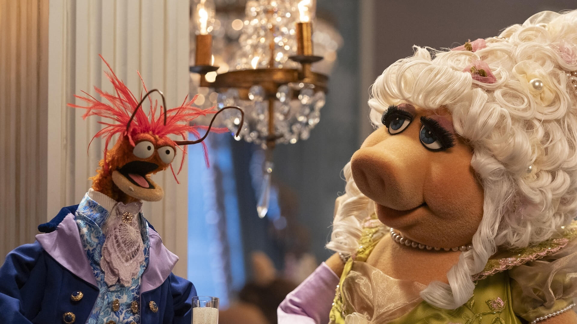 Miss Piggy with another muppet in The Muppet Show
