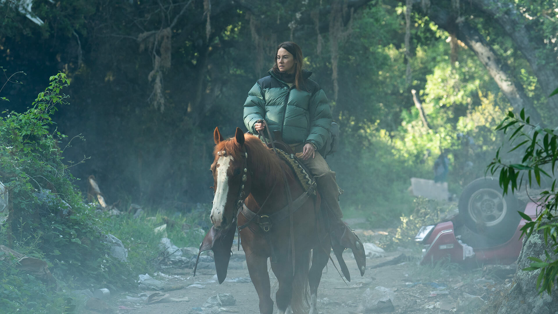 Annie riding a horse in Paradise.