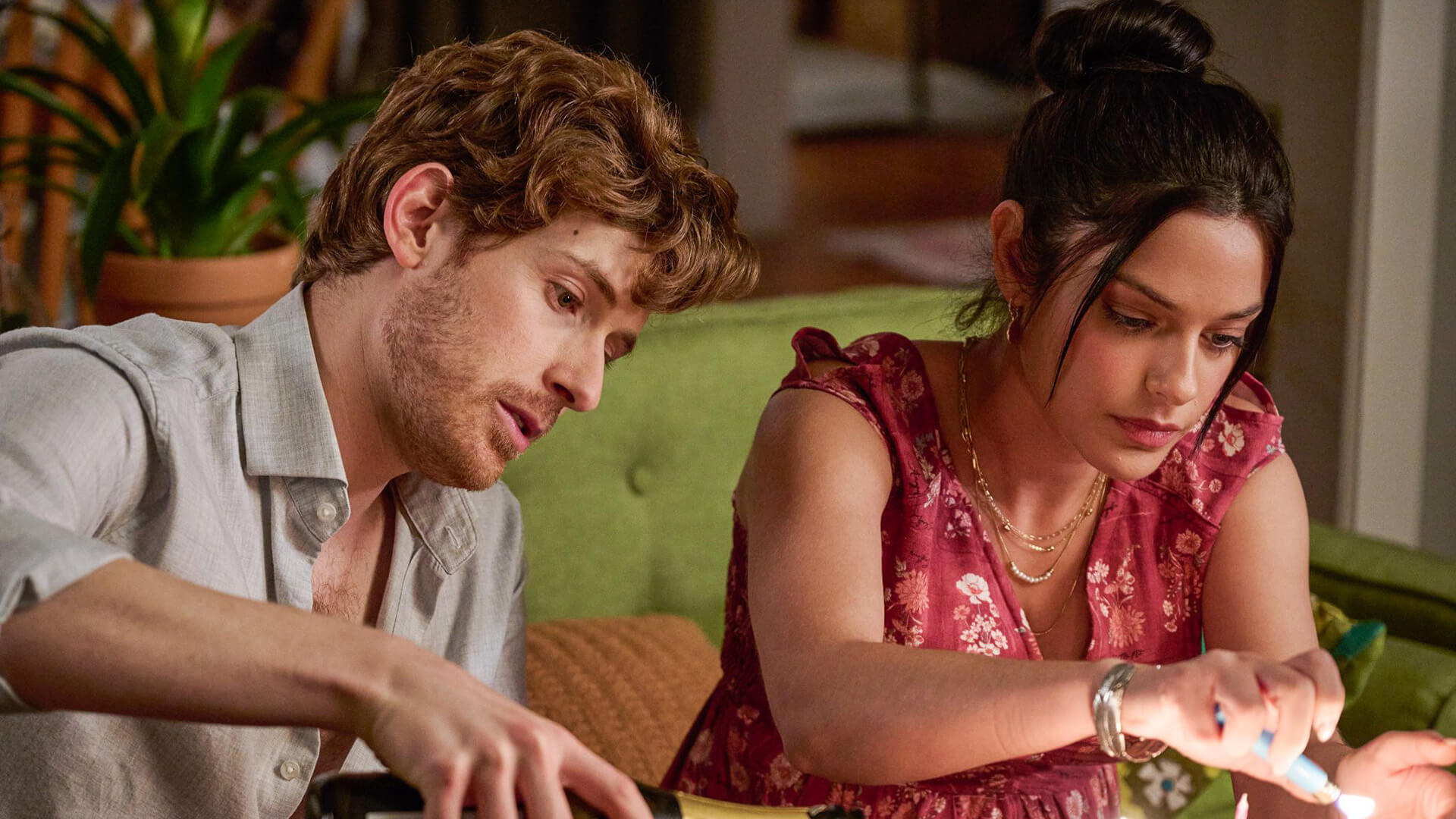 Jeff and Maria sitting in the kitchen in Memory of a Killer.