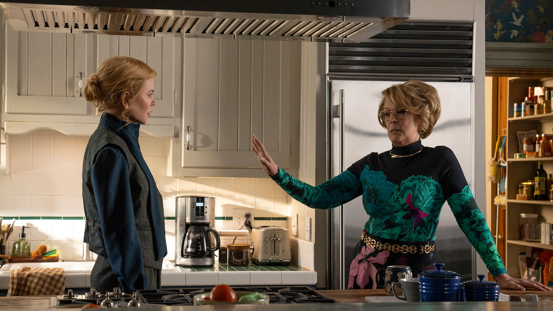 Kay and Dorothy arguing in the kitchen in Scarpetta.