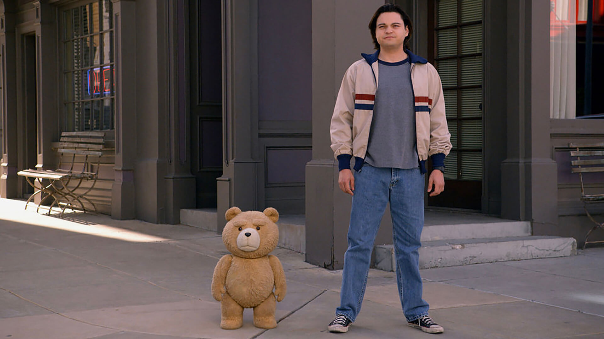 Ted and John standing outside in Ted.