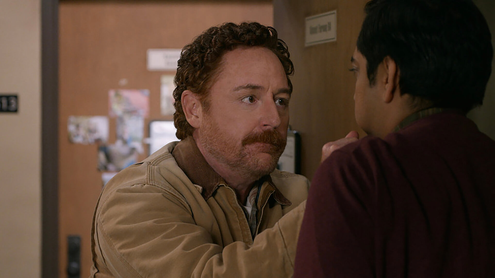 Matty with his hands on a young man's lapel in Ted.