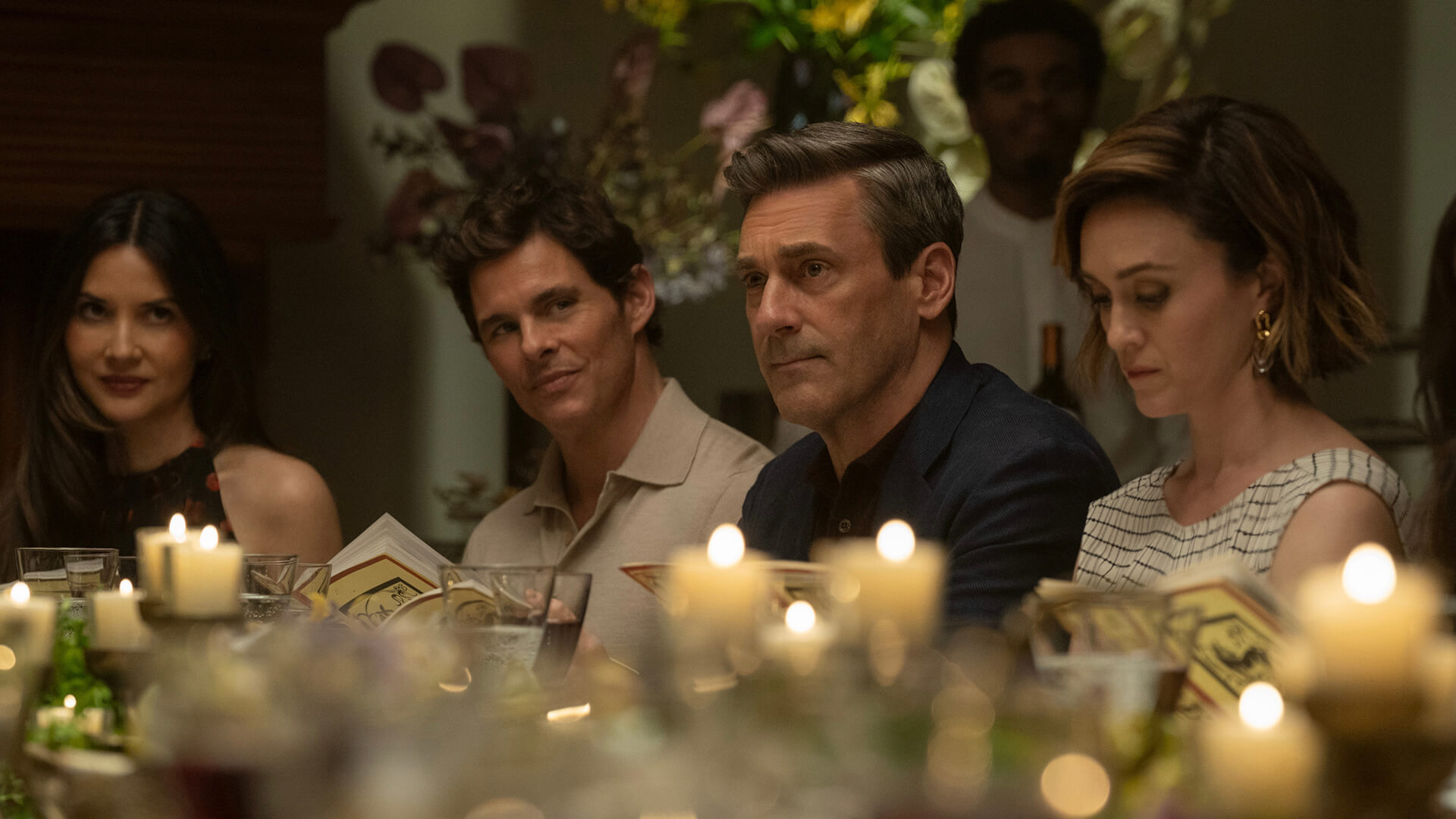 Coop and others at dinner in Your Friends & Neighbors.