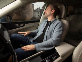 Man in car with Dirac Spaces