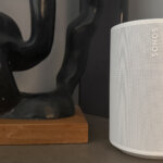 Sonos Era 100 SL on a side table.