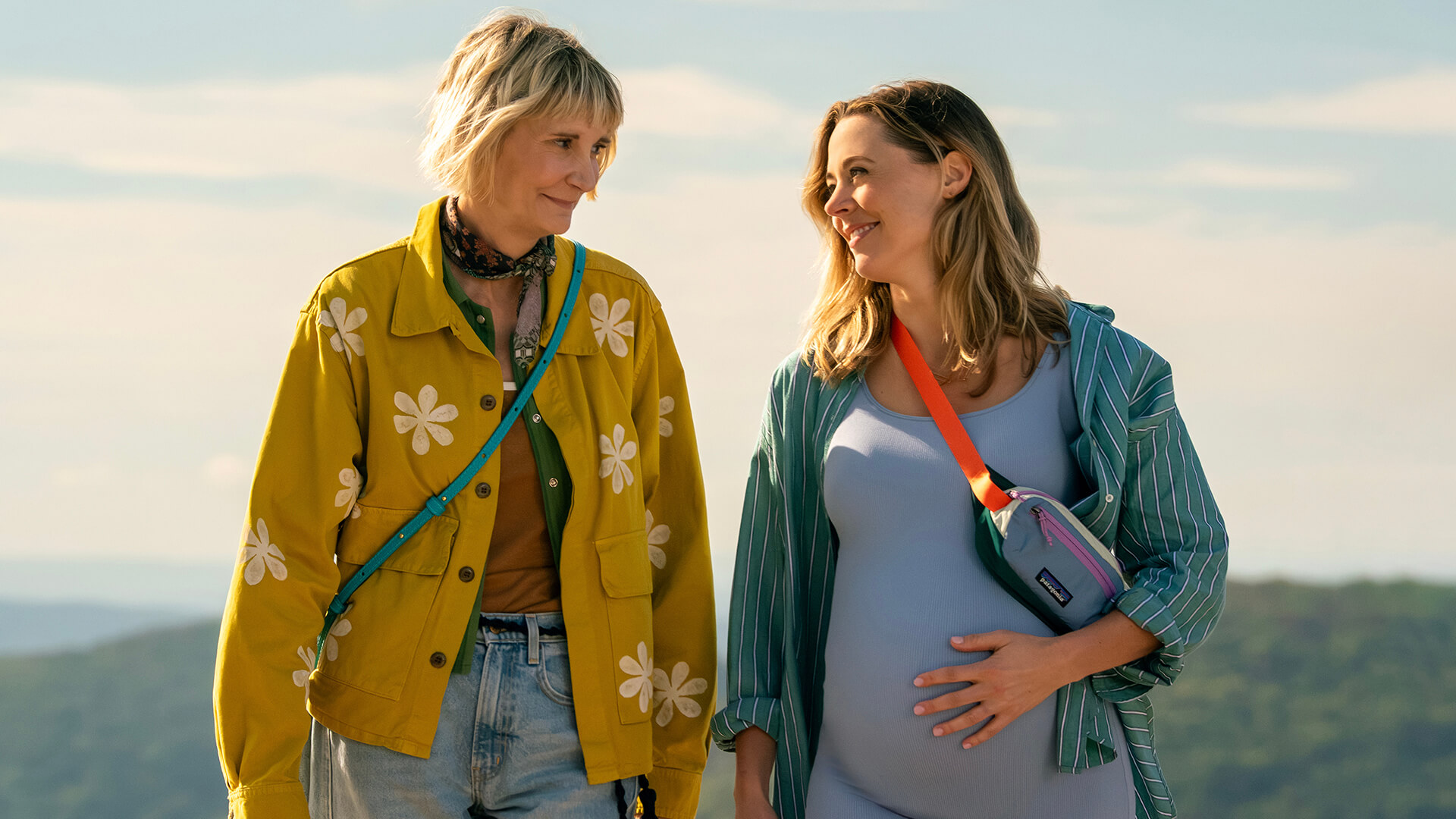 Anne walking on the beach with a pregnant Ginny in The Four Seasons.