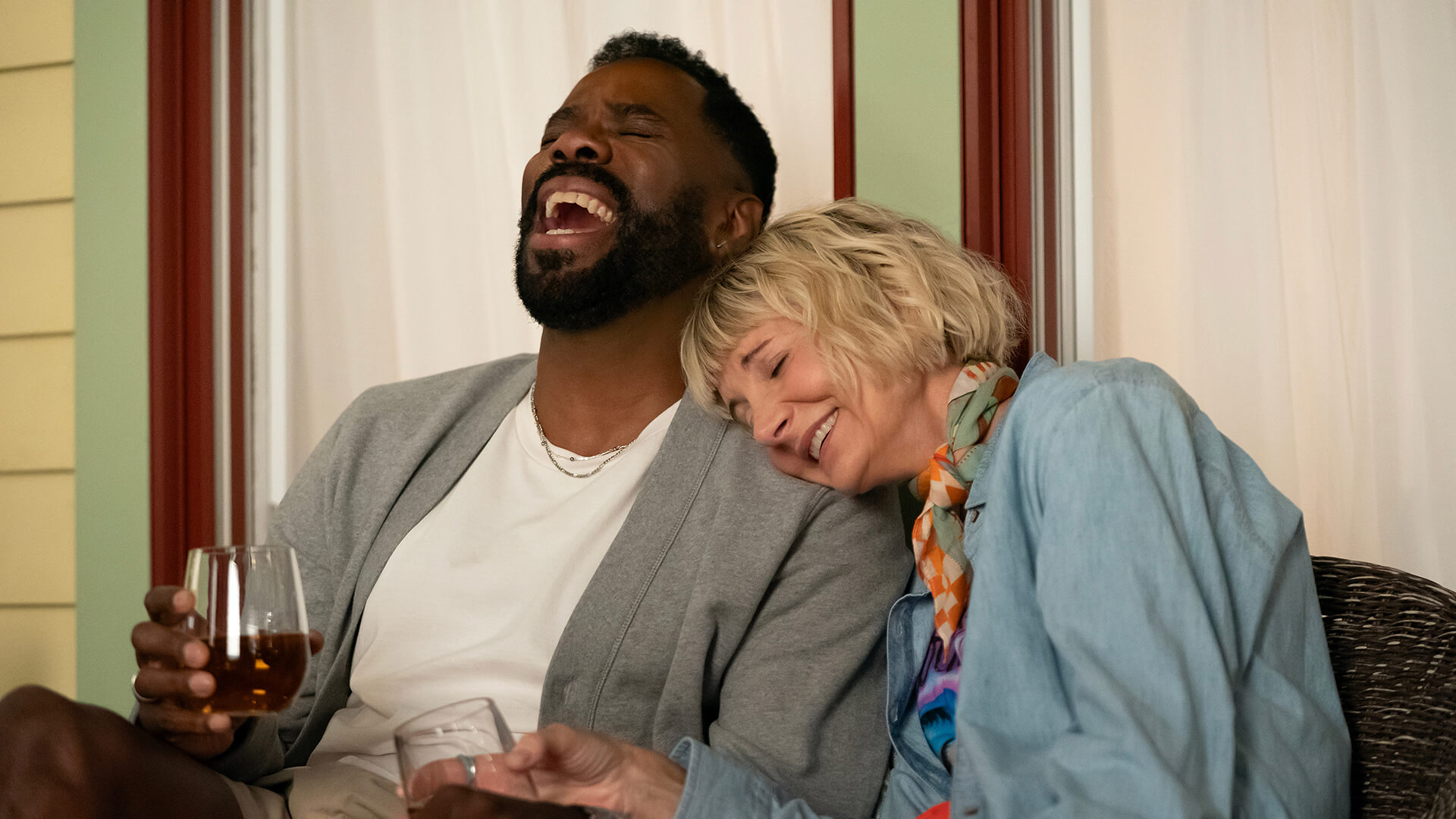Danny laughing, Anne resting her head on his shoulder in The Four Seasons.