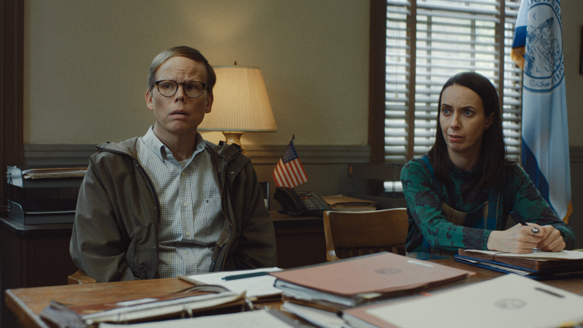 Dale and Patricia sitting in the office in Widow's Bay.
