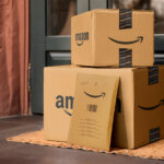 Amazon boxes in front of a door.