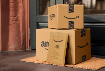 Amazon boxes in front of a door.