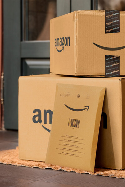 Amazon boxes in front of a door.