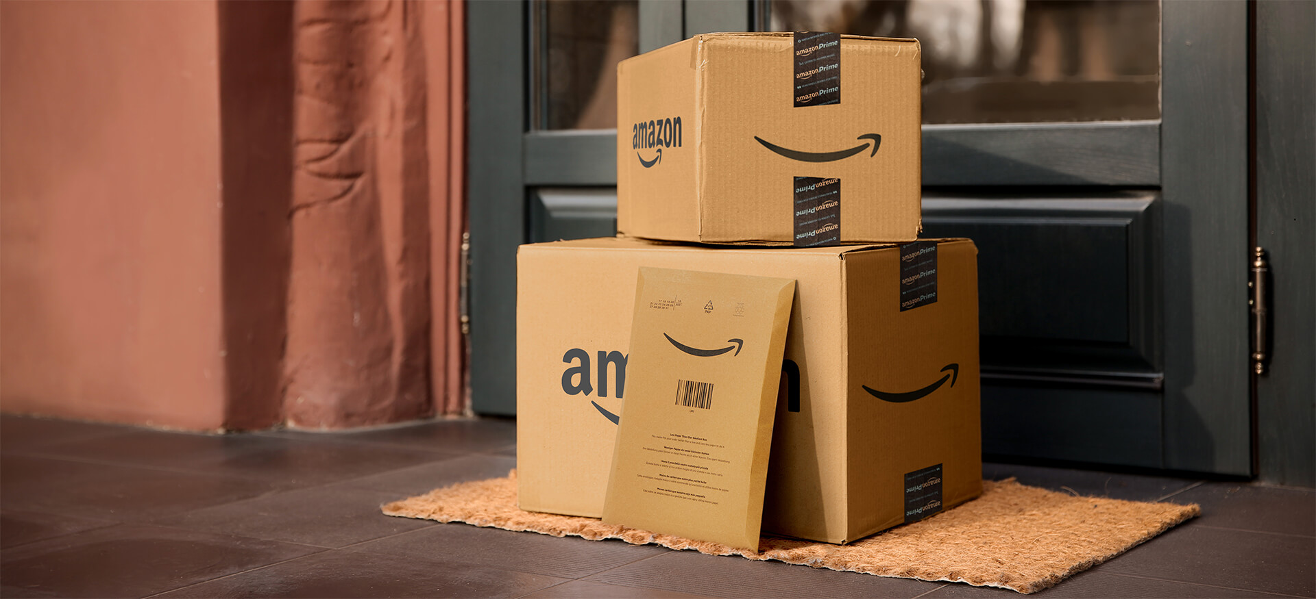 Amazon boxes in front of a door.