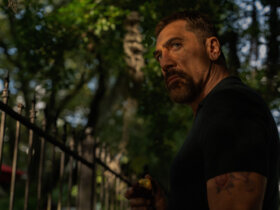 Max standing outside looking menacing in Cape Fear.