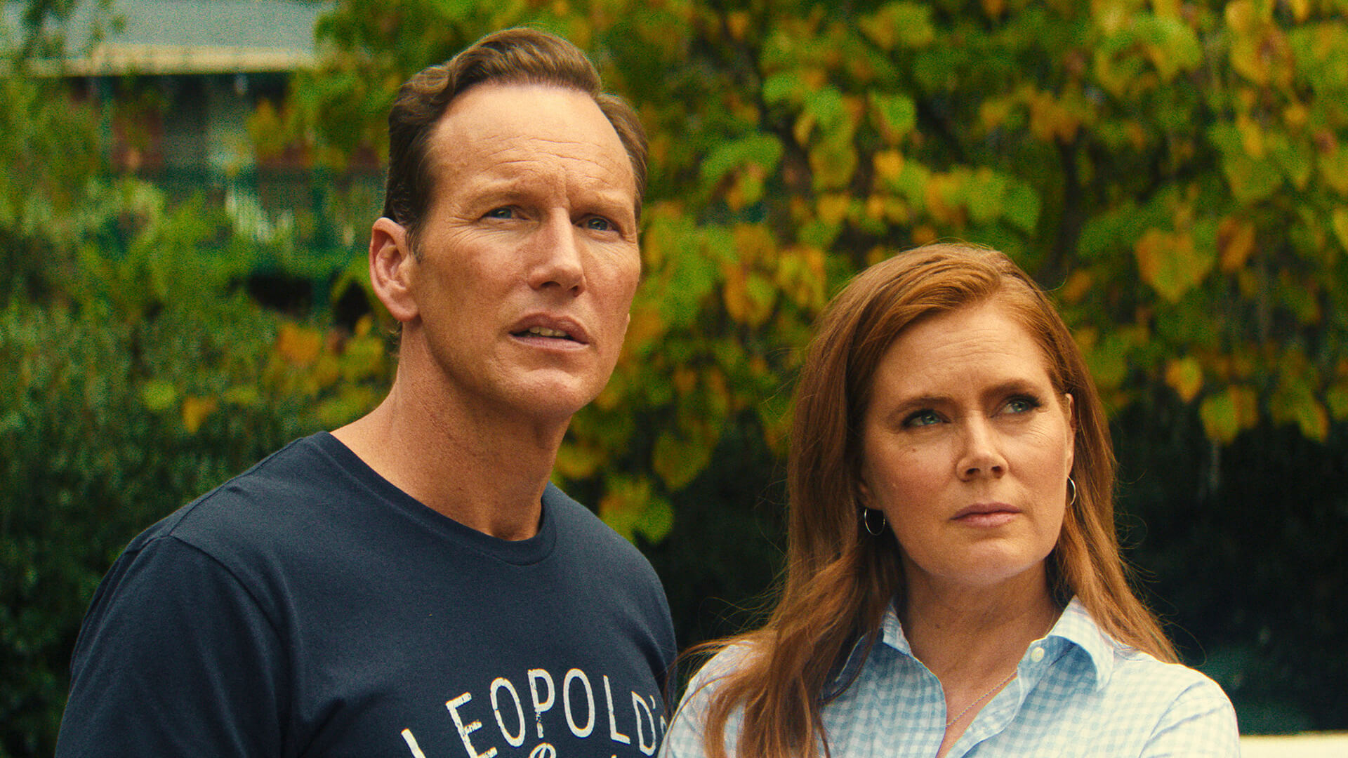 Tom and Anna standing outside their house in Cape Fear.