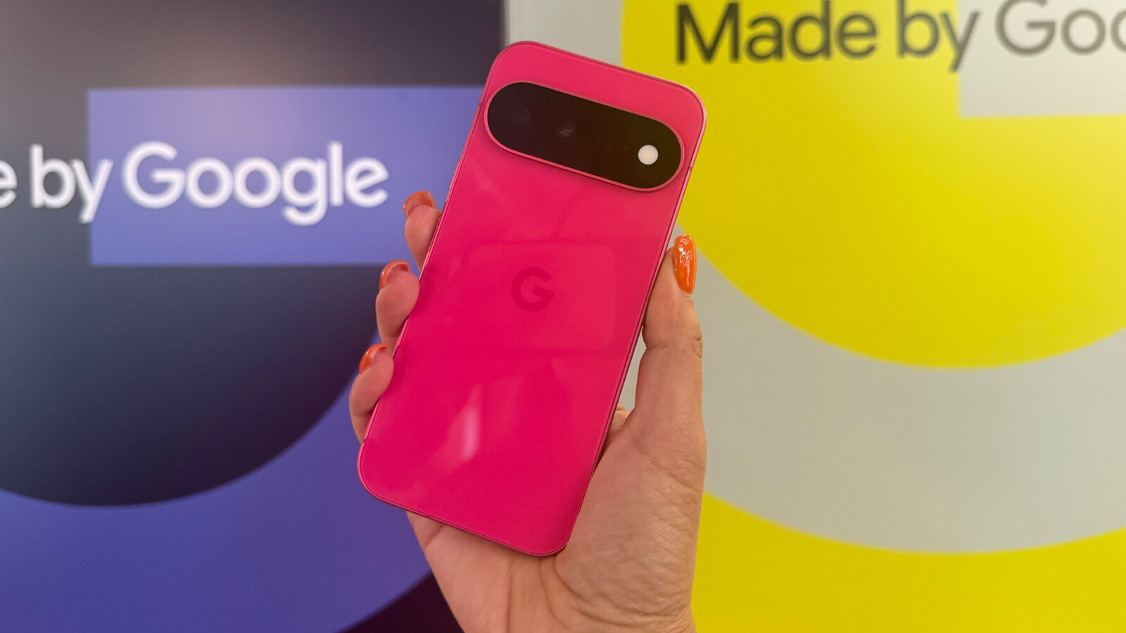 Google Pixel 11 phone in bright pink.