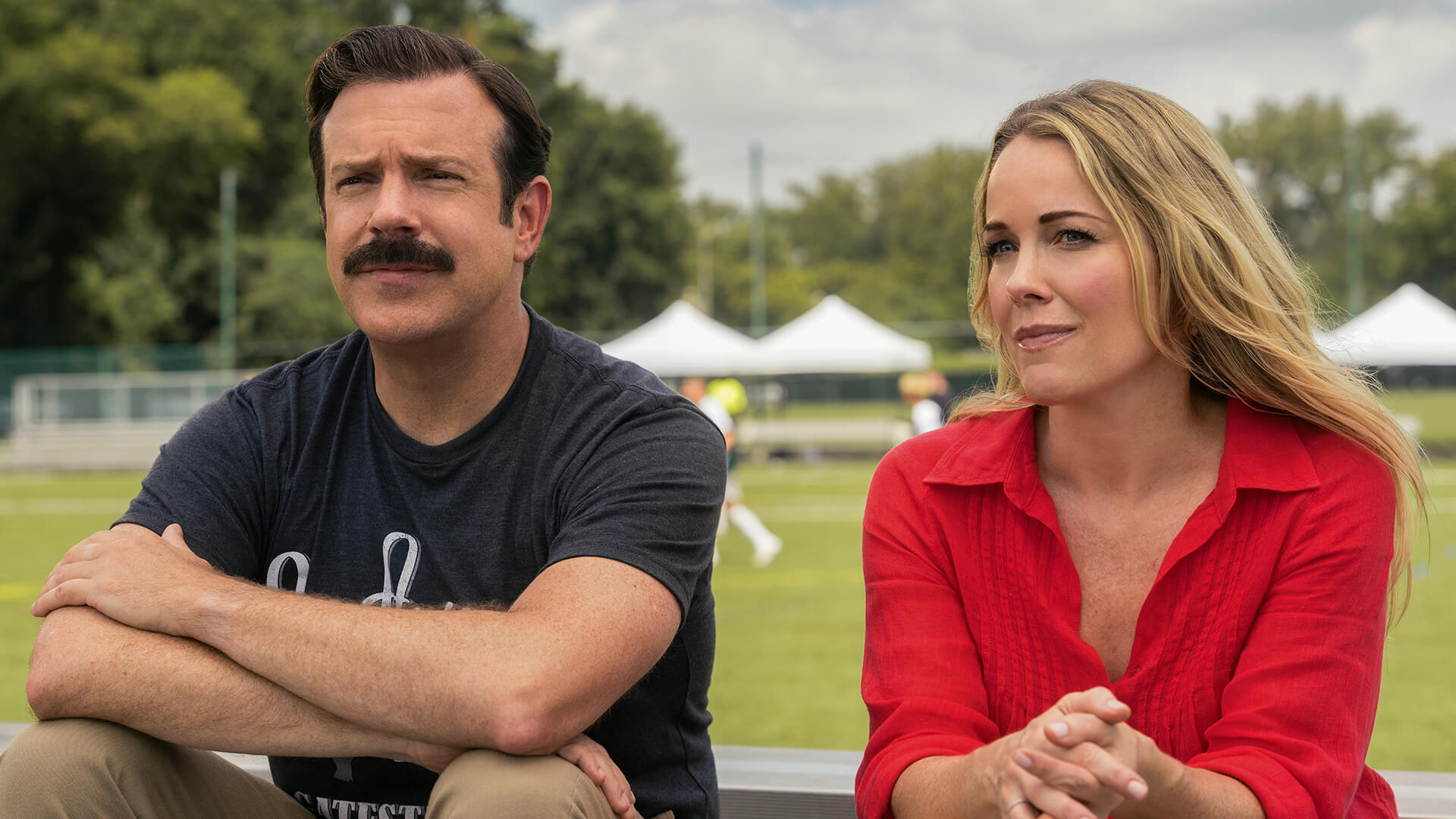 Ted and Michelle watching Henry's soccer game in Ted Lasso.
