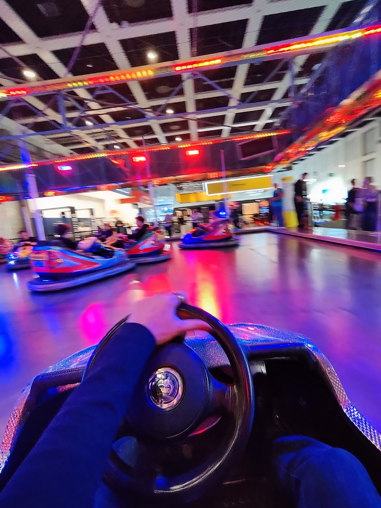 A view of bumper cars at IFA 2026 in Berlin, taken with the Rokid glasses.